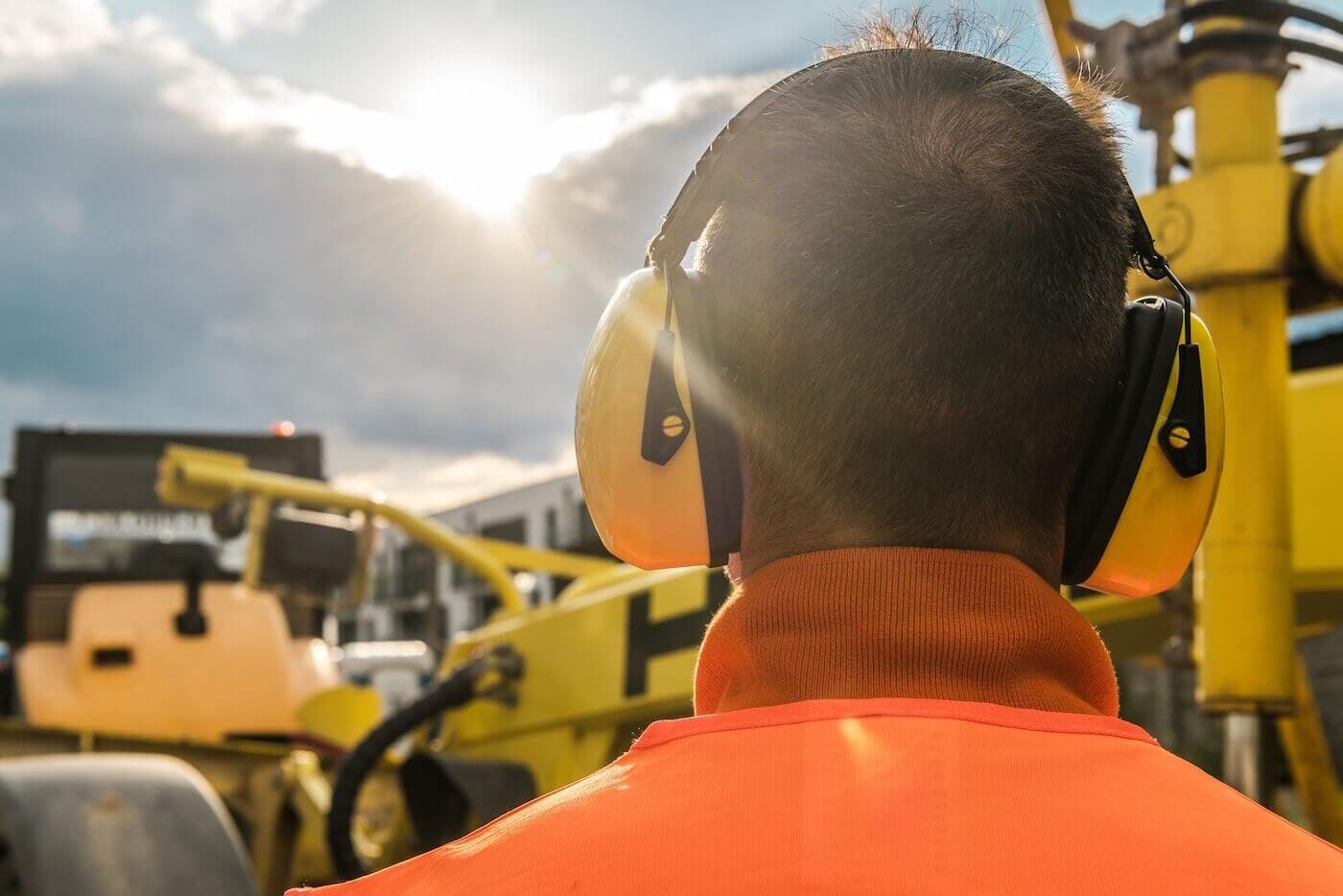 Worker wearing hearing protection